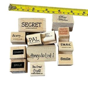 Lot of 12 mini word rubber stamps. Most of the stamps are brand new.